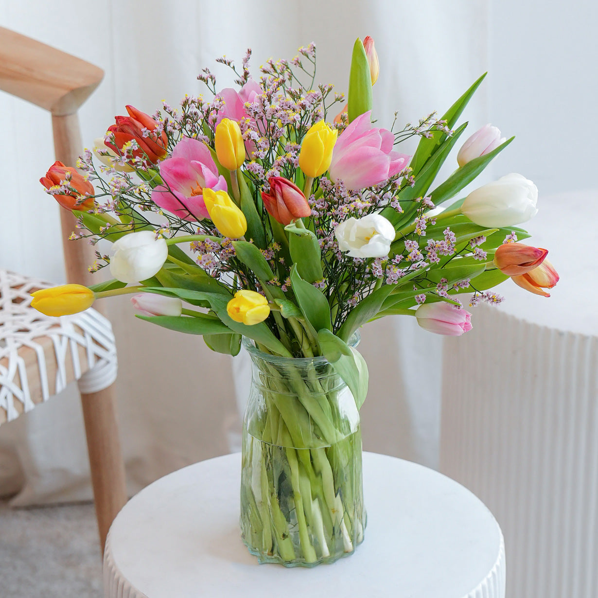 Pink orchid in white vase